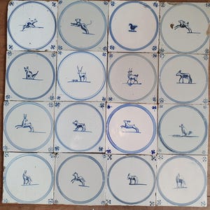 16 x Field of antique Dutch tiles with animals 18th antique dutch delft blue circle tile 18th century springer circle tiles