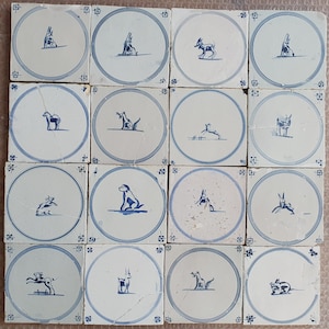 16 x Field of antique Dutch tiles with animals 18th antique dutch delft blue circle tile 18th century springer circle tiles