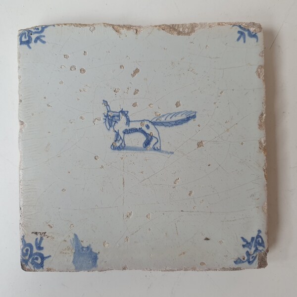 17th century Antique Dutch Tile - egel, rare! dutch delft blue fox with duck in its mouth