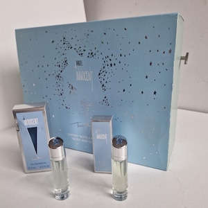 Thierry Mugler Angel Innocent musicbox storagebox in seal with 2 bottles retired Rare Innocence By Thierry Mugler, full, good conditon 10 ml