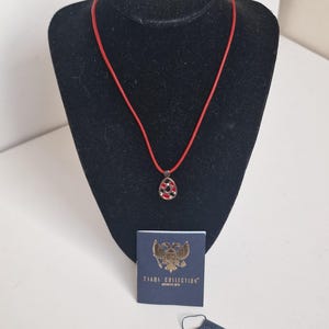 Tatiana Fabergé, coa, geëmailleerde eierhanger 925 sterlingzilver 24-karaats goud, zirkoon, met koordsleutelkoord