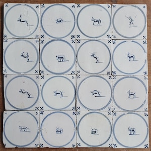 16 x Field of antique Dutch tiles with animals 18th antique dutch delft blue circle tile 18th century springer circle tiles