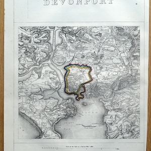 May include: A black and white map of Devonport, England, showing the proposed parliamentary boundary in 1868, the parliamentary boundary in 1832, the municipal boundary, and the parish and township boundaries. The map is titled "Devonport" and includes a scale bar and a legend.