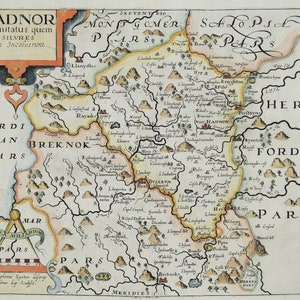 May include: An antique map of Radnor, Wales, with detailed borders and place names. The map is printed on paper with a cream background and features a compass and scale in the bottom left corner. The map is titled "Radnor Comitatus quem Silvres Olim Incoluerunt" and includes the text "SEPTENT RIO", "MONTGOMER PARS", "SALOP PARS", "CARDIGAN PARS", "BREKNOK", "HEREFORD PARS", "OCIDENS", "CAR MAR", "MERIDIES", "ORIENS", and "SCALA MILIARIVA PARS".