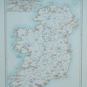 May include: An antique map of Ireland, showing population figures. The map includes county borders, place names, and numerical data, with a detailed inset of Dublin. The title "IRELAND" is clearly visible.
