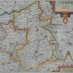 May include: An antique map of the county of Cambridge, England, with a compass rose in the lower right corner. The map is hand-colored and shows the surrounding counties, including Norfolk, Suffolk, Huntingdonshire, Bedfordshire, and Lincolnshire. The map is titled "CAMBRIDGE Comitatus quem olim ICENI Infederunt."