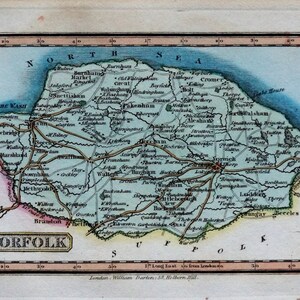 May include: An antique map of Norfolk, England, with a light blue background and brown lines showing roads and rivers. The map is surrounded by a brown frame and includes the text "Norfolk" in a brown box at the bottom. The map also includes the text "London, William Darton, 58, Holborn Hill."