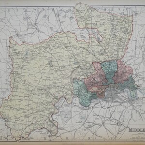 May include: A vintage map of Middlesex, England, showing the county's boundaries, roads, and towns. The map is printed in black and white with colored accents, and includes the text "MIDDLESEX" in the lower right corner.