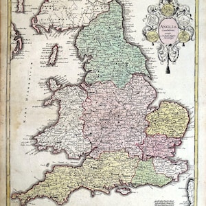 May include: An antique map of England, showing the counties and regions of the country. The map is in a vintage style, with a decorative border and a title cartouche. The map is colored in shades of green, pink, and yellow.