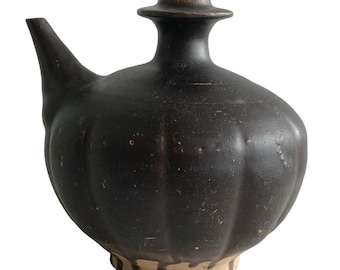 Gran melón Kendi de la dinastía Song china, esmaltado en negro, siglo XIII