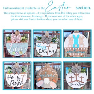 Peut inclure: Une collection de six diff&eacute;rentes d&eacute;corations de porte sur le th&egrave;me de P&acirc;ques. Les d&eacute;corations de porte sont toutes rondes et pr&eacute;sentent divers motifs, notamment des lapins, des croix et les mots "Joyeuses P&acirc;ques", "Il est ressuscit&eacute;" et "Bienvenue".