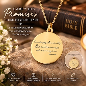 Puede incluir: Un collar con colgante circular dorado que presenta el texto grabado Exceedingly, Abundantly More than we could ask or imagine. Ephesians 3:20. El colgante cuelga de una cadena delicada, con un recuadro que muestra una opción de grabado posterior.