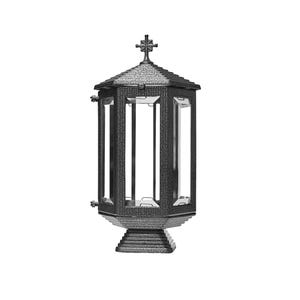 May include: A black metal lantern with a cross on top and a glass enclosure. The lantern has a textured finish and a square base.