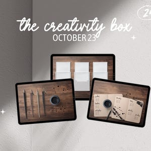 May include: Three digital screens displaying various creative supplies. The first screen shows a wooden surface with four calligraphy pens. The second screen shows three white envelopes on a wooden surface. The third screen displays a notebook with black ink splatters and a calligraphy pen on a wooden surface. The text "the creativity box OCTOBER 23" is at the top of the image.