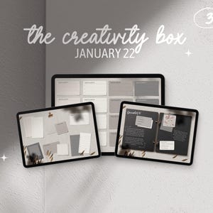 May include: Three digital planners with the text "the creativity box JANUARY 22" on a gray background. The planners are open to show different pages with blank spaces, calendar grids, and lined pages.