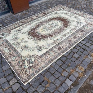 Large Vintage Oushak Rug: 6x9 ft Turkish Wool Kilim