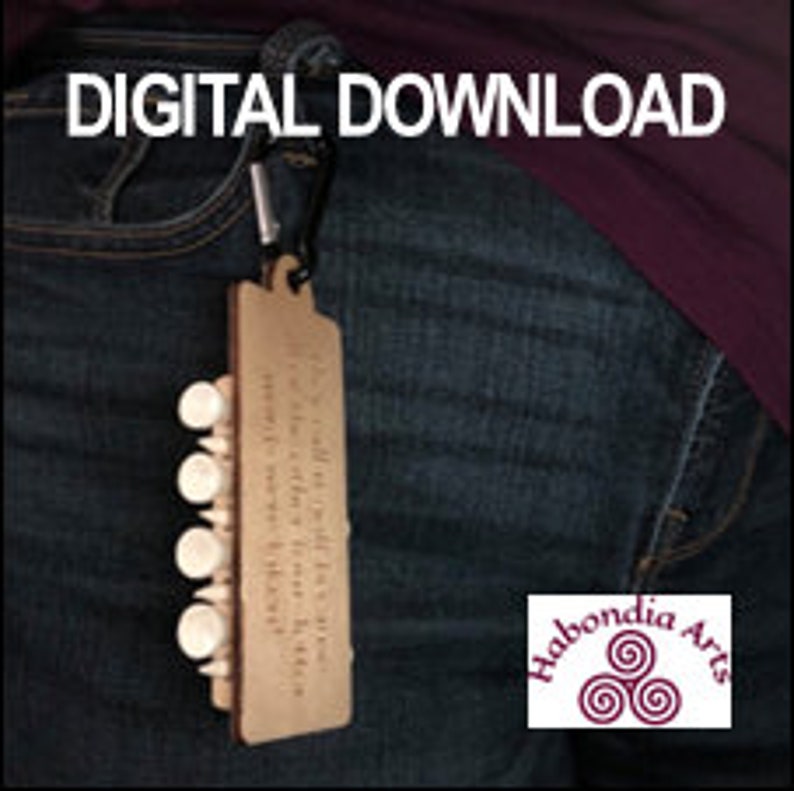 May include: A wooden keychain with a golf ball design and the text "It's all about the little things... that make you smile" engraved on it. The keychain is attached to a silver carabiner clip.