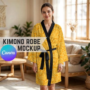 May include: A yellow paisley-patterned kimono robe with black trim and a matching belt. The robe is worn by a person. The text "KIMONO ROBE MOCKUP" and the Canva logo are visible on the image.