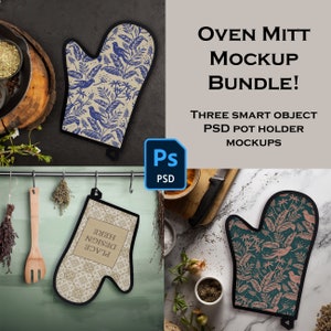 May include: Three oven mitts with different patterns. The mitts are hanging on a rack in a kitchen setting. The mitts are made of fabric and have a black trim. The patterns are a blue floral design, a beige floral design with the text "PLACE DESIGN HERE", and a green floral design.