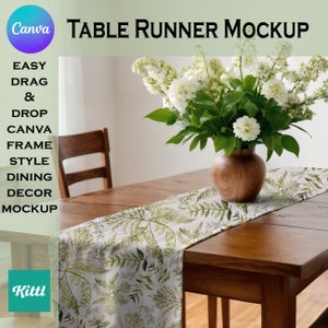 May include: A white table runner with a green leafy pattern is laid on a wooden table. A vase with white flowers sits on the table runner. The text "TABLE RUNNER MOCKUP" is at the top of the image.