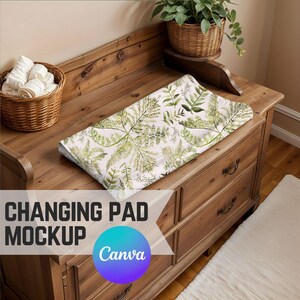 May include: A changing pad mockup with a white background and a green leafy pattern. The pad is on top of a wooden dresser with drawers.