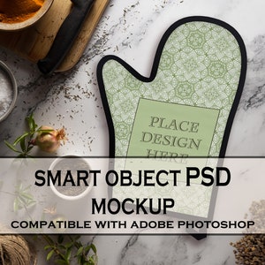 May include: A green oven mitt with a black border and a white mandala pattern. The mitt has a rectangular area in the centre with the text "PLACE DESIGN HERE".  SMART OBJECT PSD MOCKUP COMPATIBLE WITH ADOBE PHOTOSHOP.