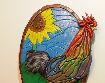 Wooden picture with three-dimensional inlay representing a free-range rooster.