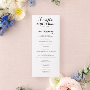 May include: A wedding ceremony program with the names Lisette and Isaac and the date July 22nd. The program lists the order of events for the ceremony, including the processional, readings, gospel, and recessional.