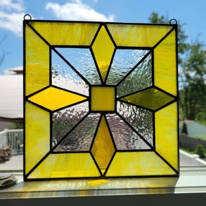 Square Star Stained Glass window hanging panel is a modern geometric panel to add some color to your home or as a stylish gift!