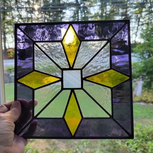 Square Star Stained Glass window hanging panel is a modern geometric panel to add some color to your home or as a stylish gift!