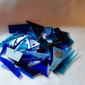 Blue stained glass scraps for sale from Graphix Glass on Etsy. Great for regular mosaics or glass on glass mosaics.
www.graphixglass.com