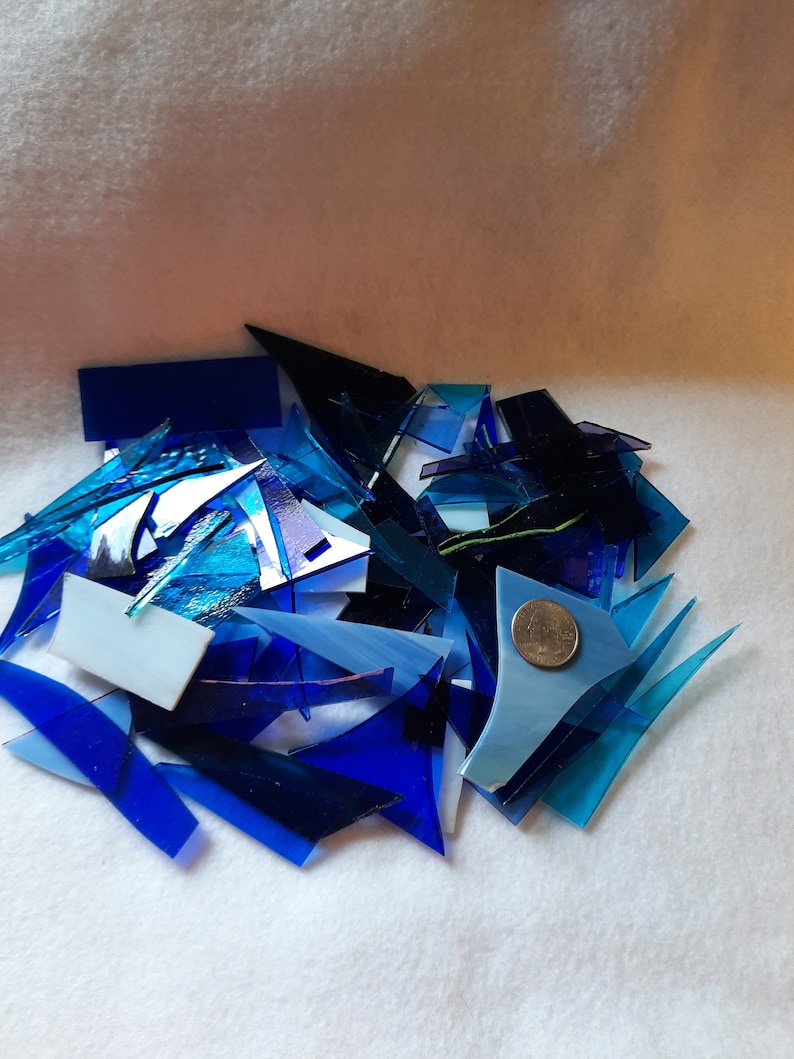 Blue stained glass scraps for sale from Graphix Glass on Etsy. Great for regular mosaics or glass on glass mosaics.
www.graphixglass.com