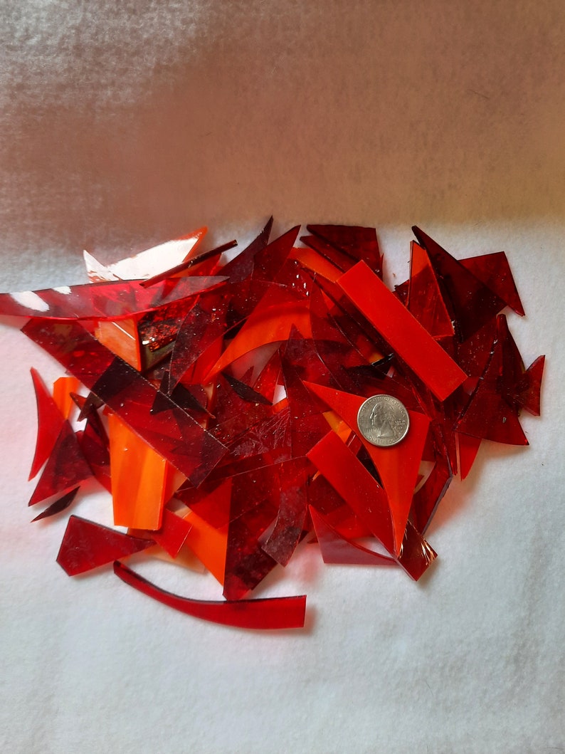Red and orange stained glass scraps for sale from Graphix Glass on Etsy. Great for regular mosaics or glass on glass mosaics.
www.graphixglass.com