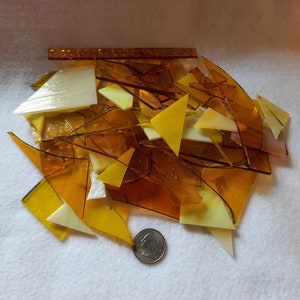 Yellow stained glass scraps for sale from Graphix Glass on Etsy. Great for regular mosaics or glass on glass mosaics.
www.graphixglass.com
