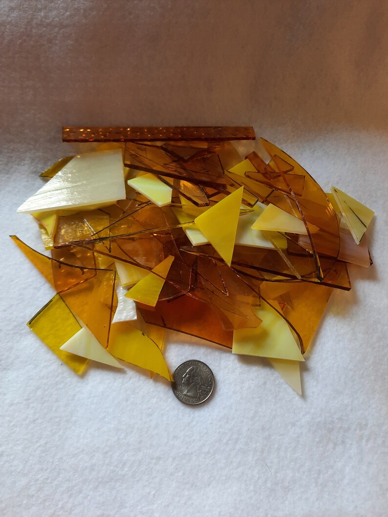 Yellow stained glass scraps for sale from Graphix Glass on Etsy. Great for regular mosaics or glass on glass mosaics.
www.graphixglass.com