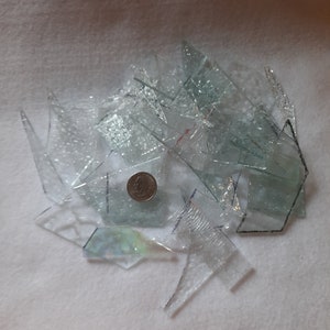 Clear textured stained glass scraps for sale from Graphix Glass on Etsy. Great for regular mosaics or glass on glass mosaics.
www.graphixglass.com