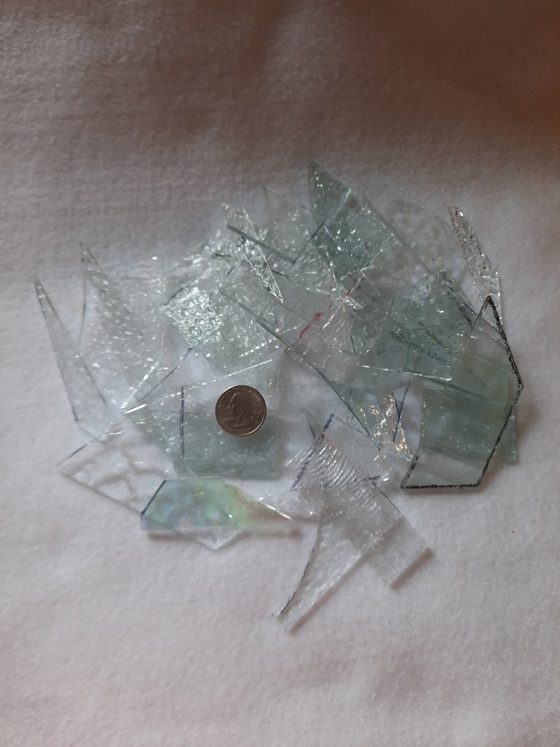 Clear textured stained glass scraps for sale from Graphix Glass on Etsy. Great for regular mosaics or glass on glass mosaics.
www.graphixglass.com