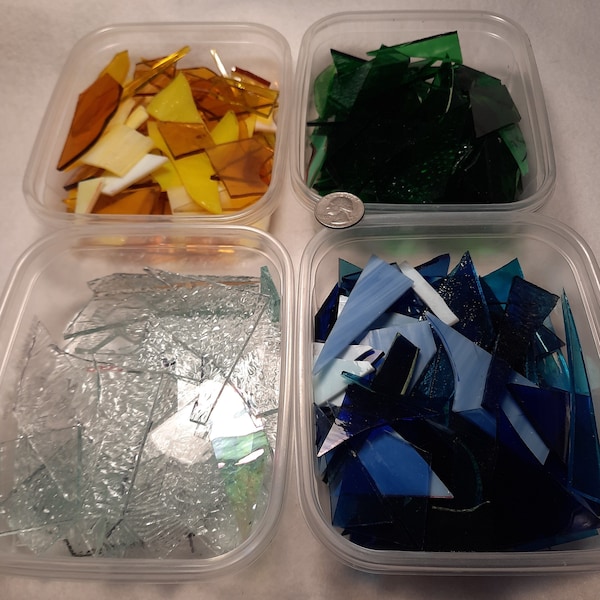 Scrap pieces of stained glass can be used for mosaics, glass on glass mosaics or your stained glass projects. Blue, green, yellow, & clears