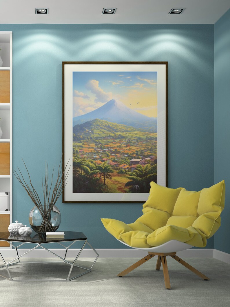 May include: A yellow armchair with a white base and wooden legs sits in a room with a framed painting of a mountain landscape. The painting is on a blue wall with recessed lighting.