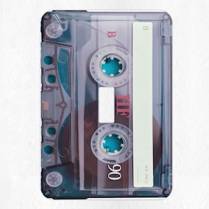 May include: A clear plastic cassette tape with a black label. The label has the text "KR. ON CD" and the number "90" printed on it. The tape has a blue plastic spool on each side.