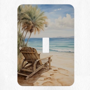 May include: A light brown wooden beach chair sits on a sandy beach with blue ocean waves in the background. Palm trees and a cloudy sky are visible.