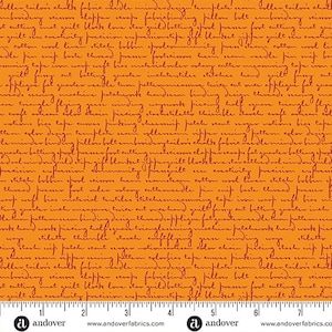May include: Orange fabric with a repeating pattern of handwritten script in a darker orange hue. The fabric includes text such as "applique", "quilting", and "stitches". A ruler is at the bottom.