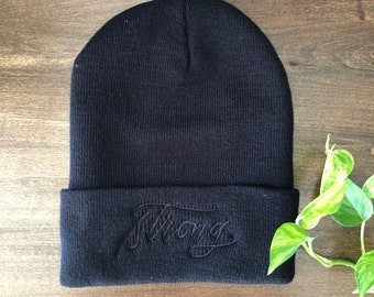 Embroidered Script "Strong" Calligraphy on Cuffed Beanie