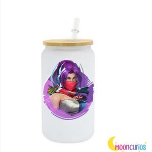May include: A white glass tumbler with a bamboo lid and a clear straw. The tumbler features a graphic of a character with purple hair, a red face covering, and a purple and white circular background. The text "Mooncurios" is in the bottom right corner.
