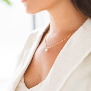 Fijne parelketting - 925 zilver verguld - satellietketting - parelketting - filigraan - minimalistisch - eenvoudig - elegant