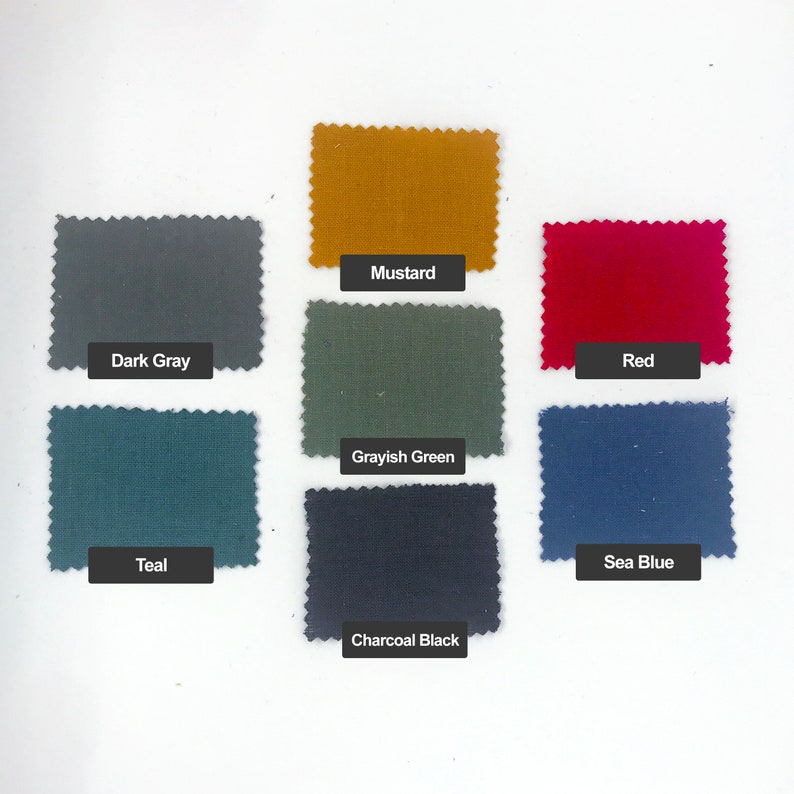 Puede incluir: Cartas de muestra de telas en varios colores, incluyendo gris oscuro, mostaza, rojo, verde azulado, verde gris&aacute;ceo, azul marino y negro carb&oacute;n.