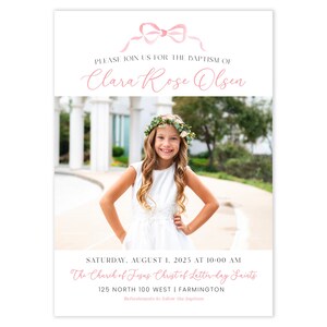 May include: A baptism invitation with a pink bow at the top. The invitation says "Please join us for the baptism of Clara Rose Olsen." The invitation also includes the date, time, and location of the baptism. A photo of a young girl in a white dress is in the background.