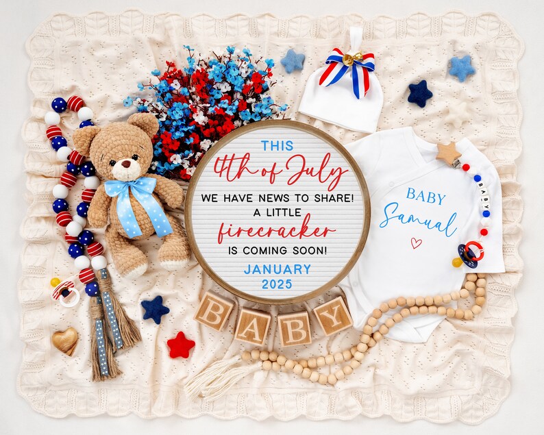 May include: A white onesie with the text "Baby Samual" in blue lettering and a red heart. A round sign with the text "This 4th of July we have news to share! A little firecracker is coming soon! January 2025". A teddy bear wearing a blue bow tie and a red, white, and blue garland.