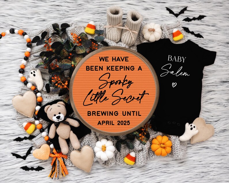 May include: A Halloween-themed baby announcement with a sign that reads "We have been keeping a spooky little secret brewing until April 2025". A black onesie with the text "Baby Salem" is also included in the image.