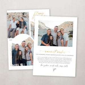May include: A Christmas card with a photo of a family of five standing in front of a rocky landscape. The card has a gold inscription that reads "warmest wishes" and a message that says "For a wonderful holiday season filled with love, joy & blessings!" The card also includes the year 2024.